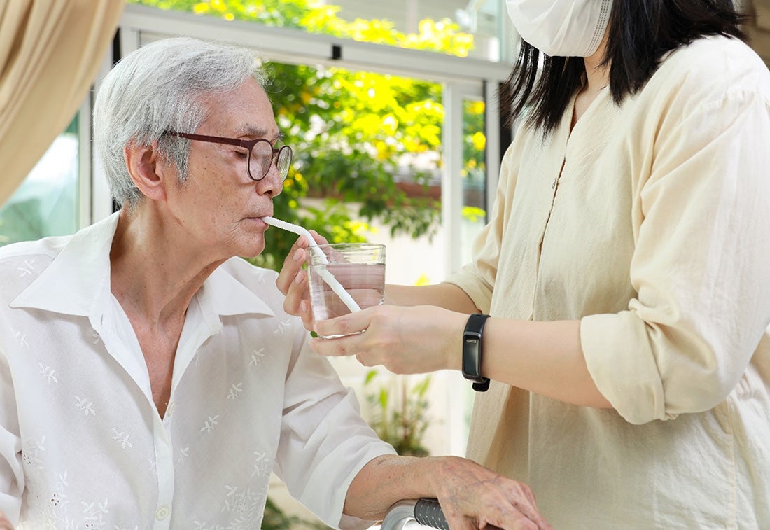 Elder man drinking